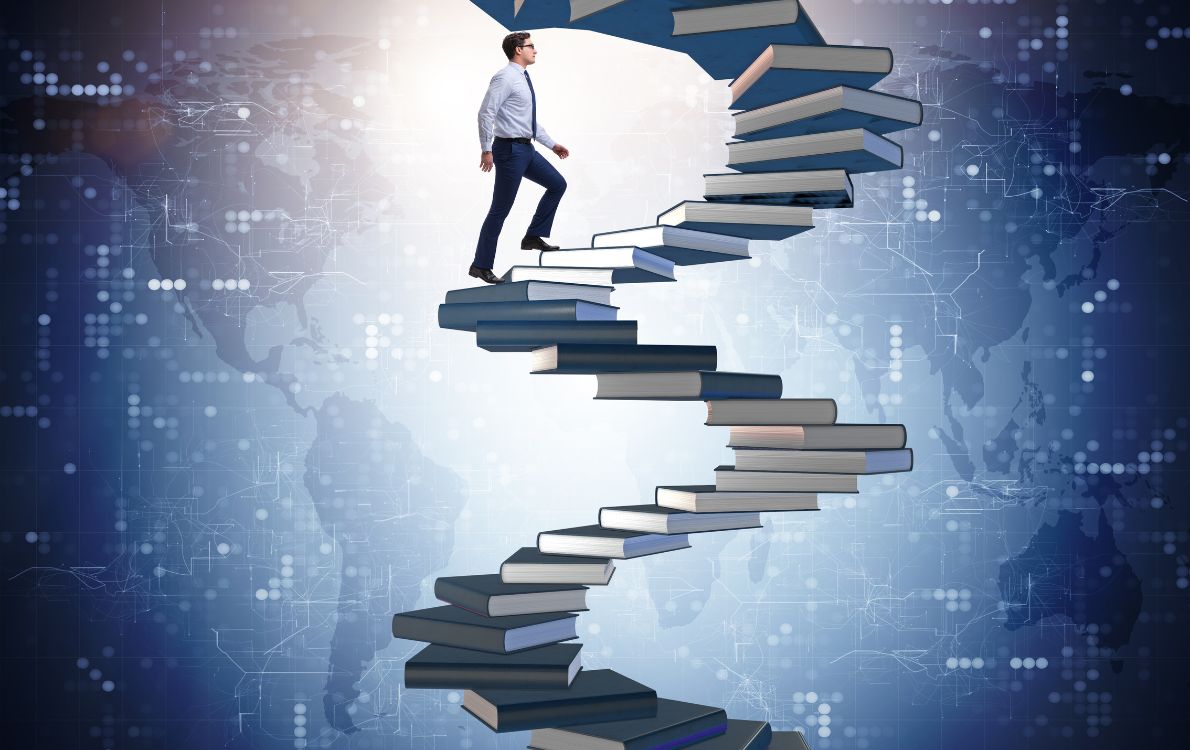 Student reviewing financial planning documents and charts